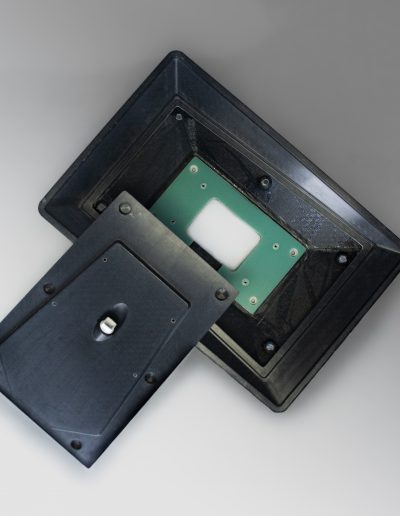 Exploded real-life image showing internal electronics space of Starlink spreader mount